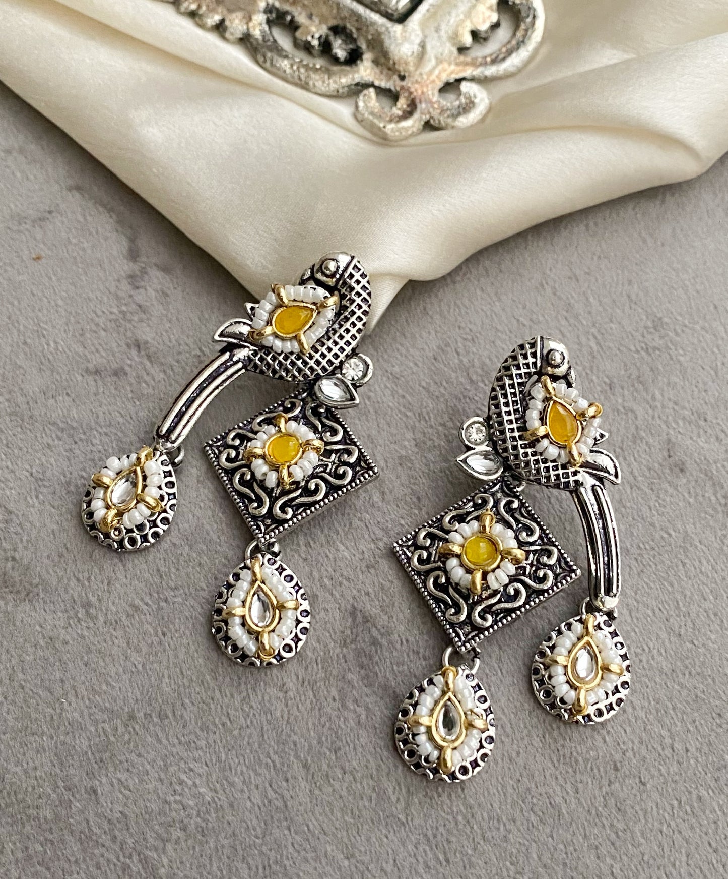 Yellow bani peacock earrings