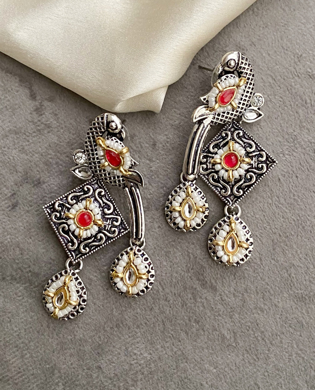 Red bani peacock earrings