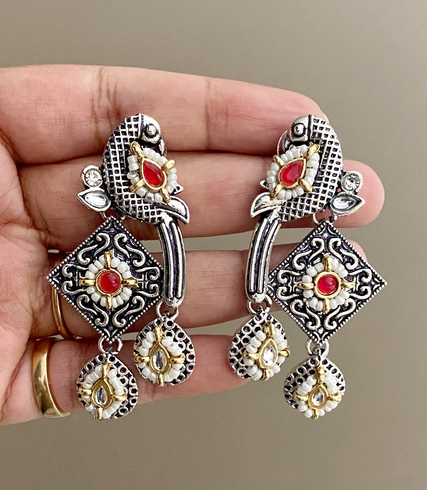 Red bani peacock earrings