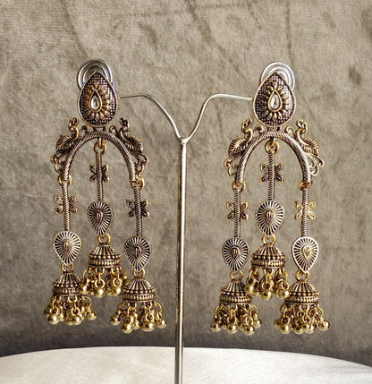 Taruni dual tone kundan earrings