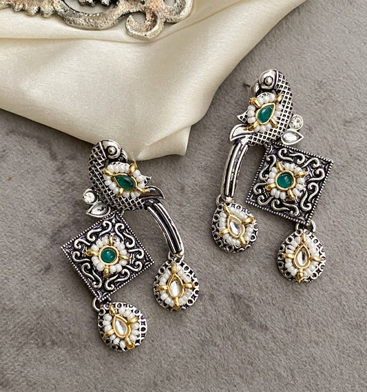 Green bani peacock earrings