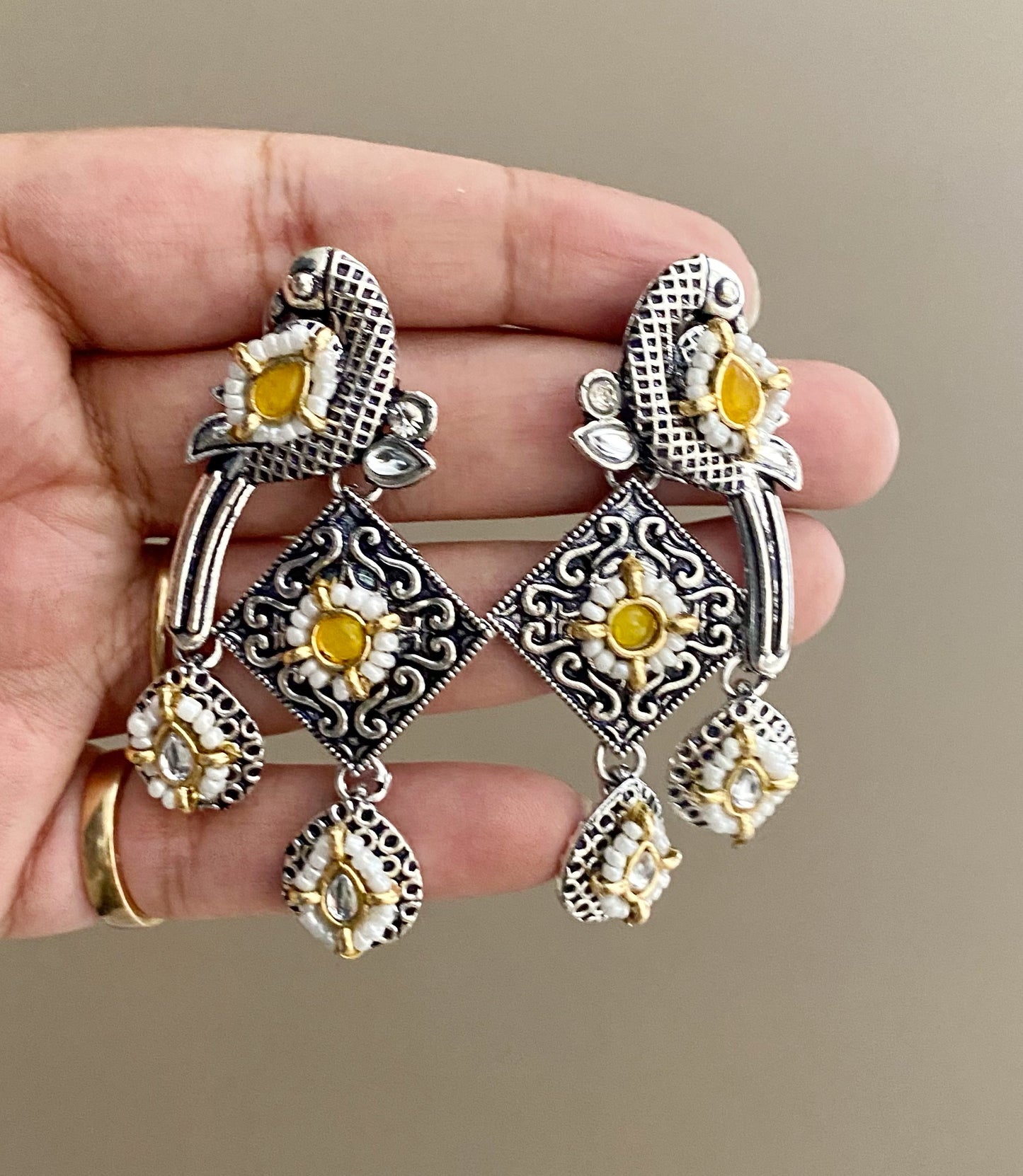 Yellow bani peacock earrings
