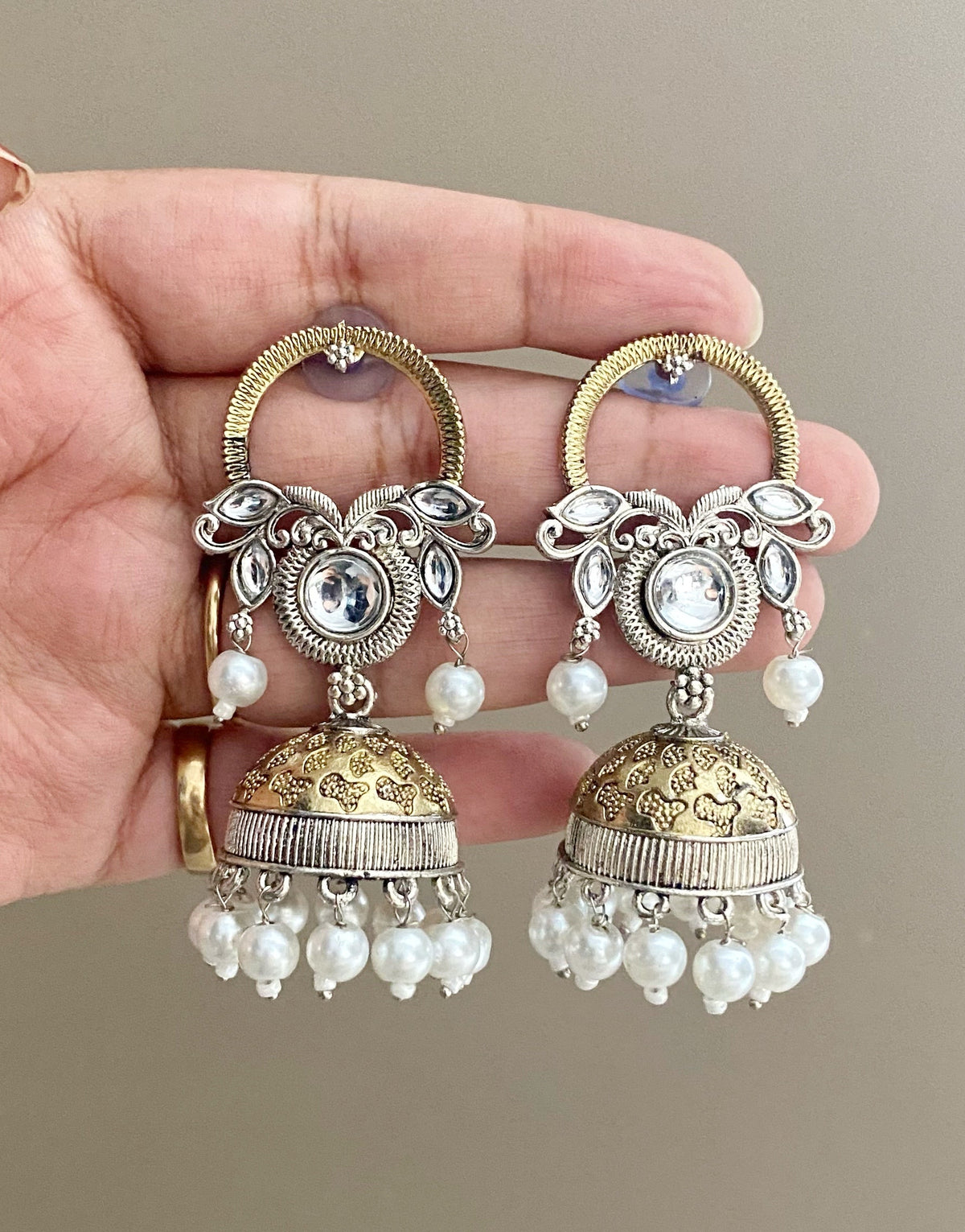 Maalika dual tone kundan earrings