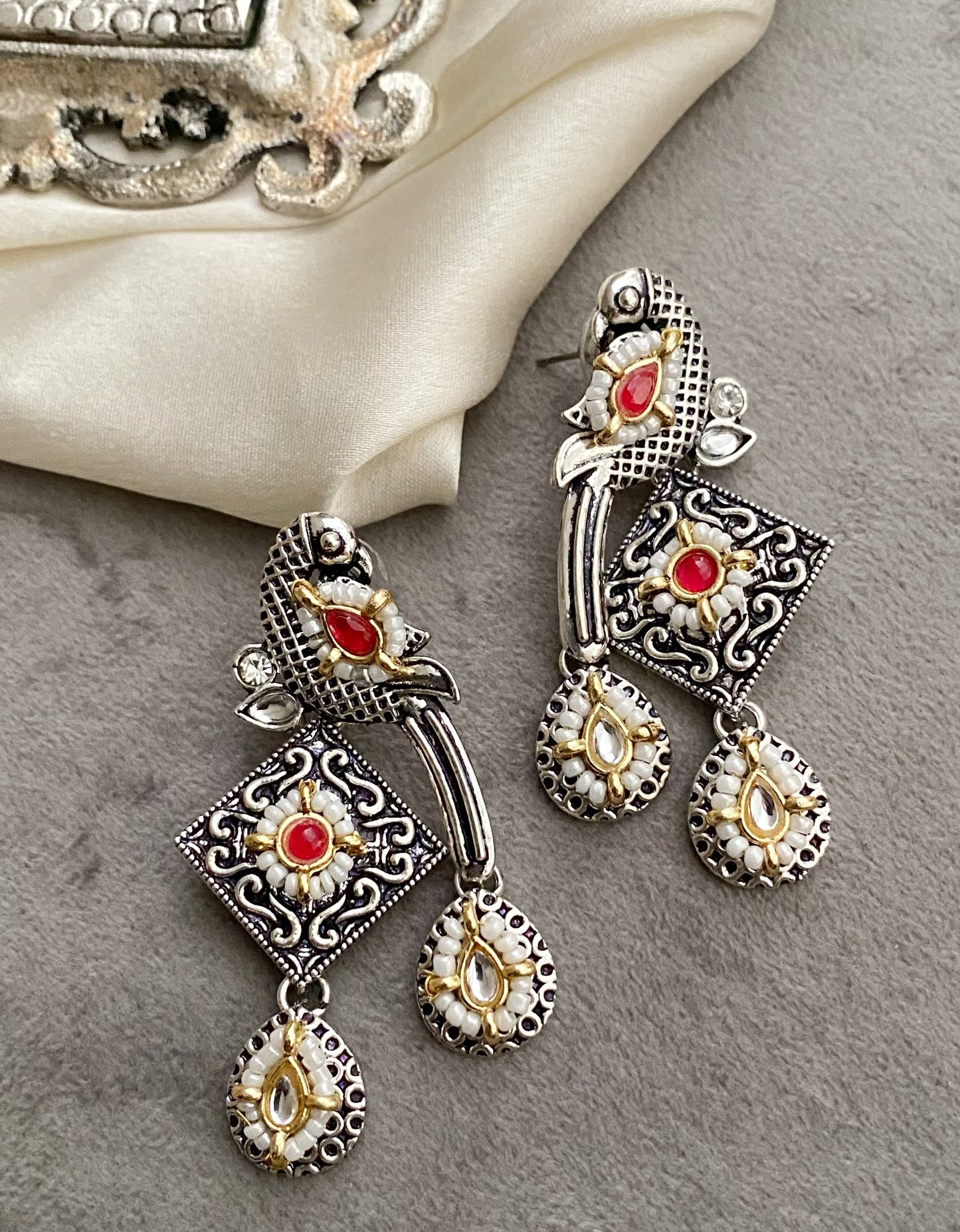 Red bani peacock earrings