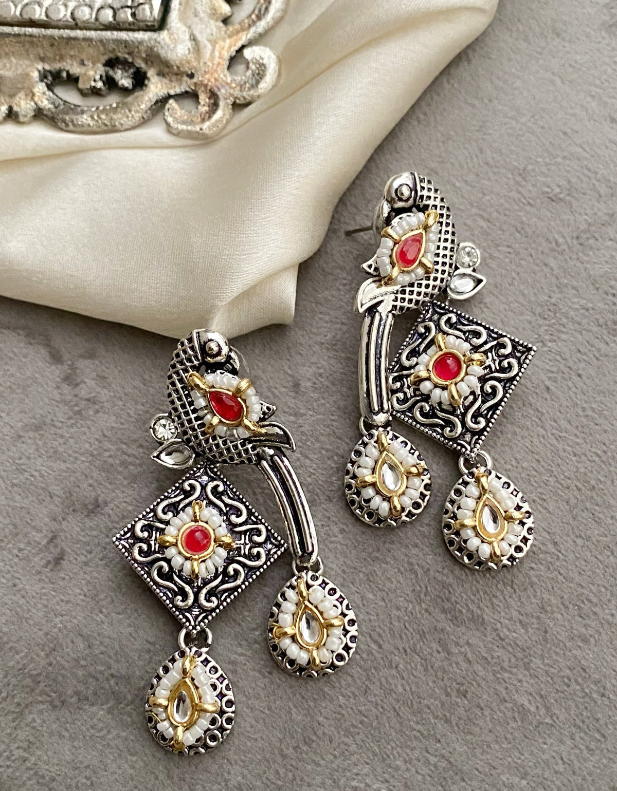 Red bani peacock earrings