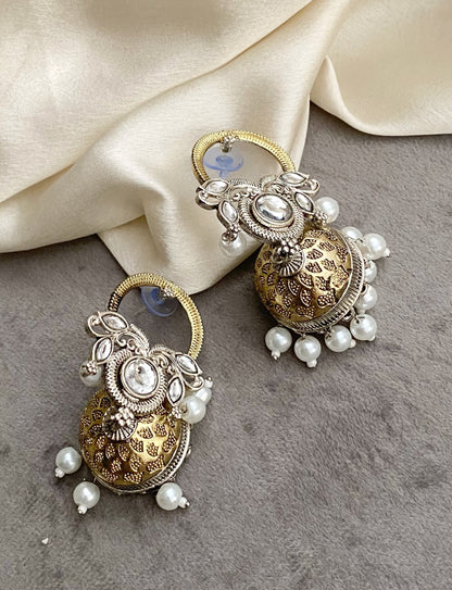 Maalika dual tone kundan earrings