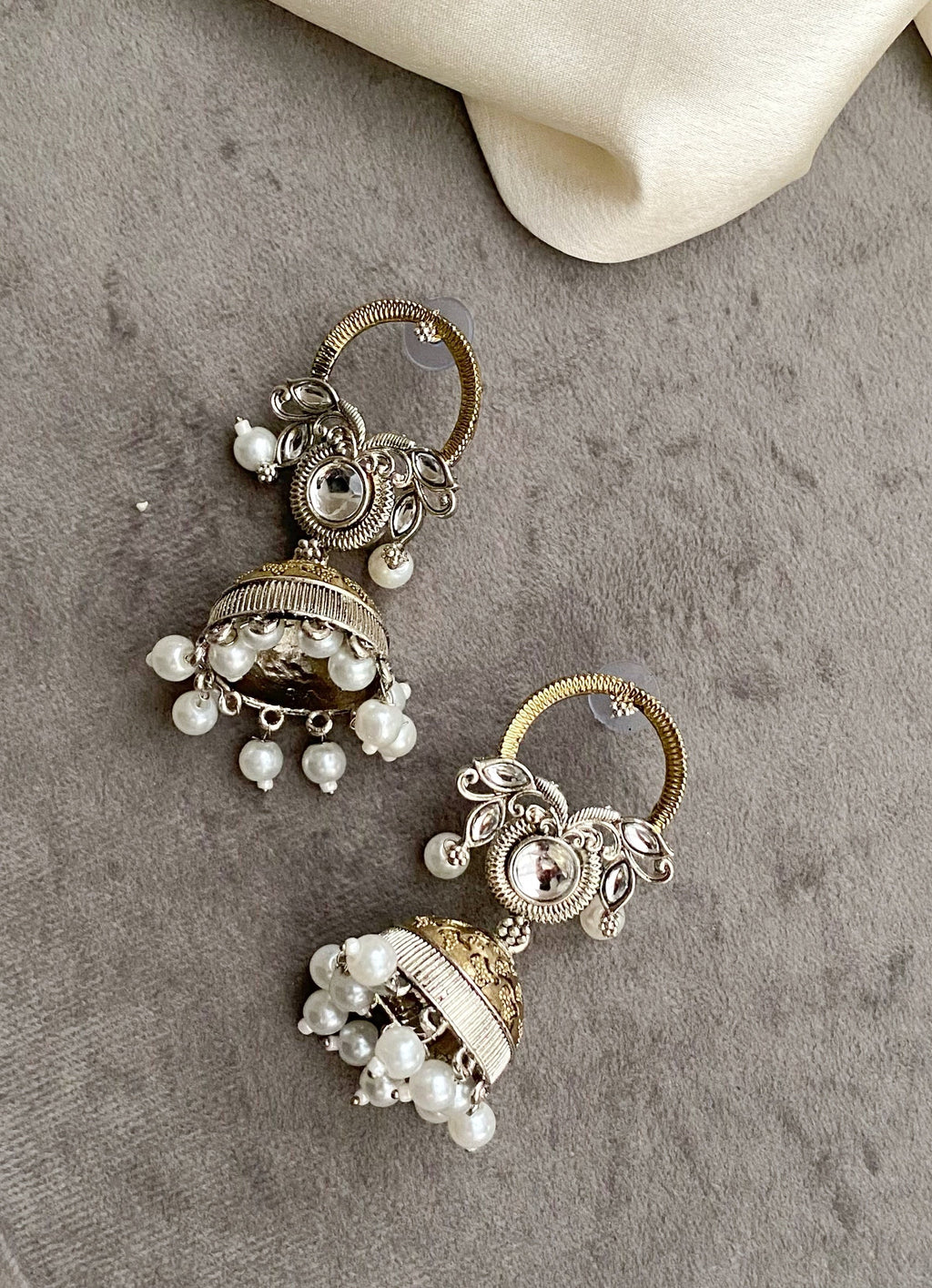 Maalika dual tone kundan earrings