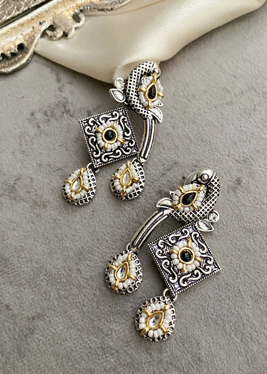 Black bani peacock earrings