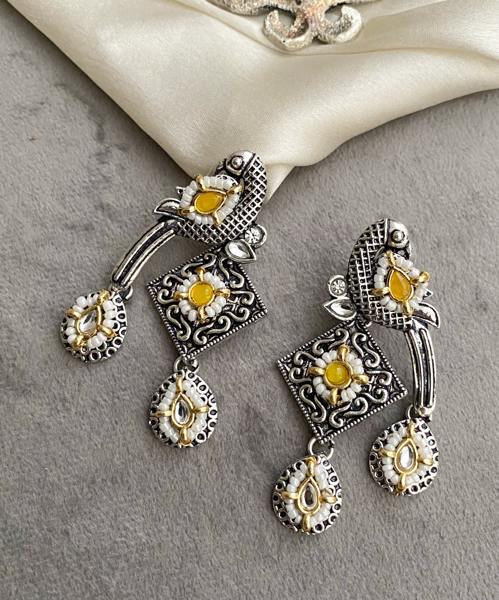 Yellow bani peacock earrings