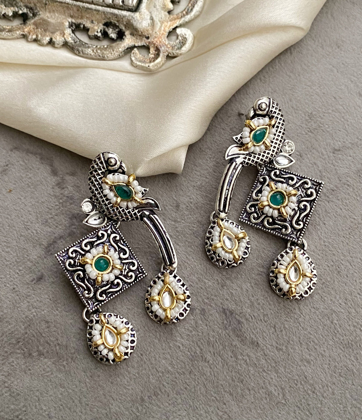 Green bani peacock earrings