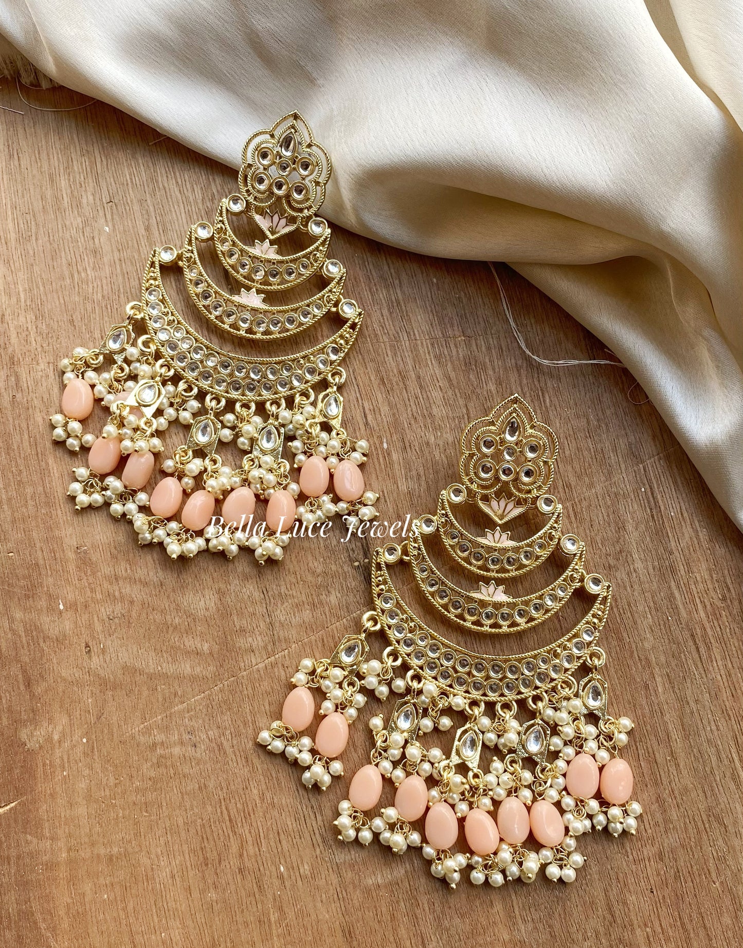Sia peach kundan chandbali