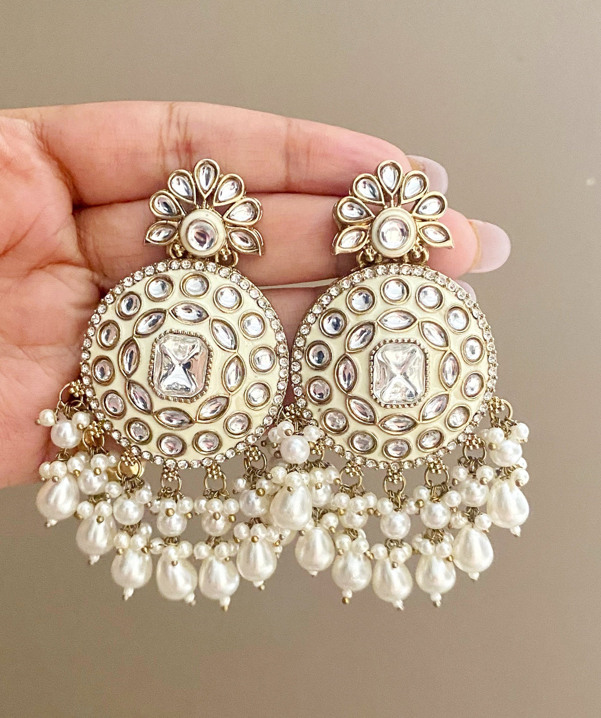 Tiya ivory kundan earrings