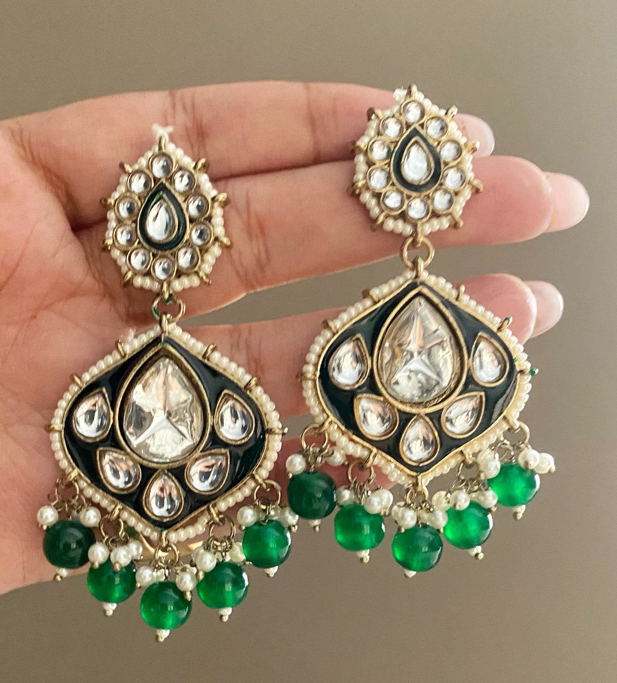 Liya Green kundan earrings