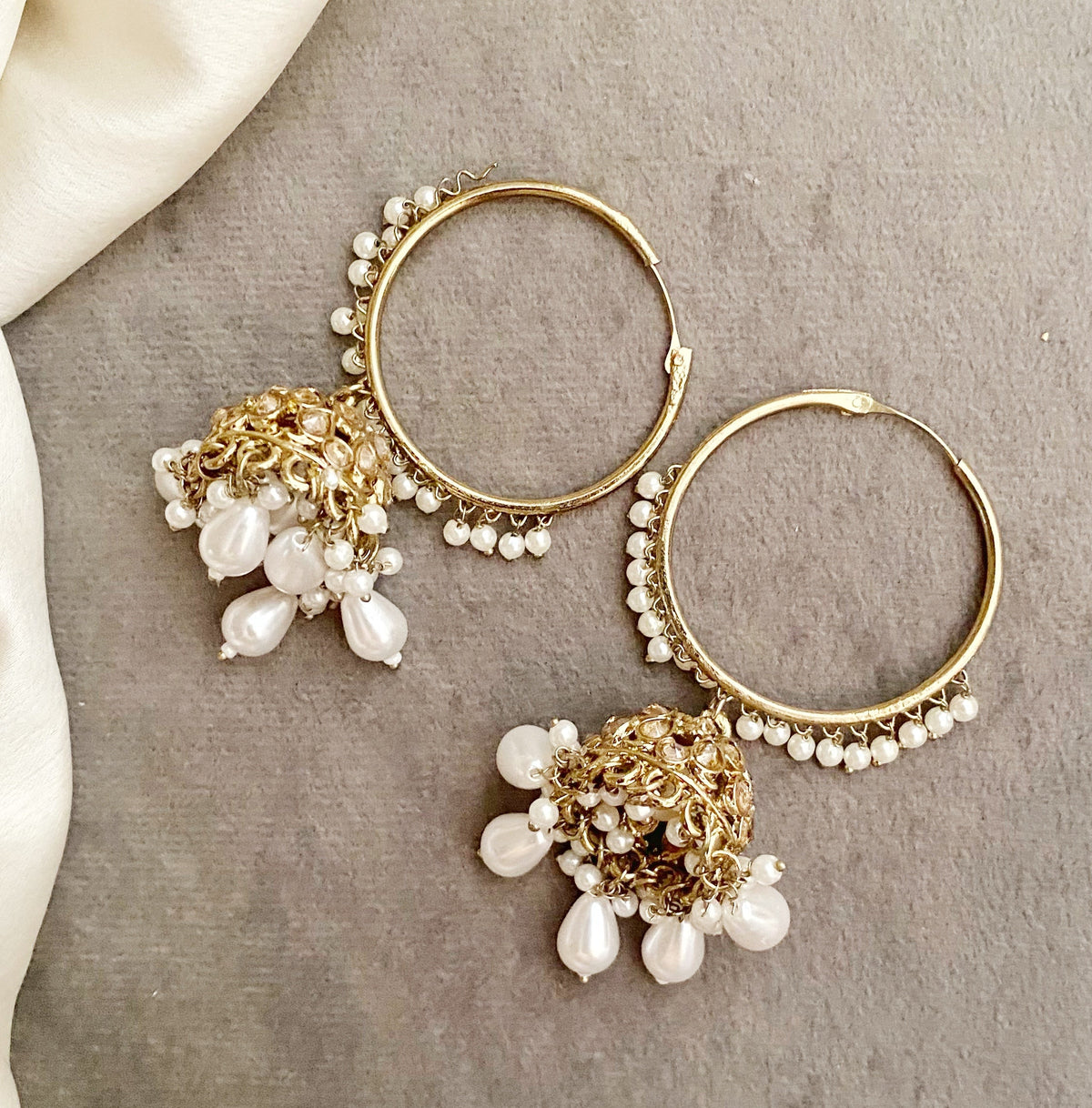 Neeta white bali jhumka earrings