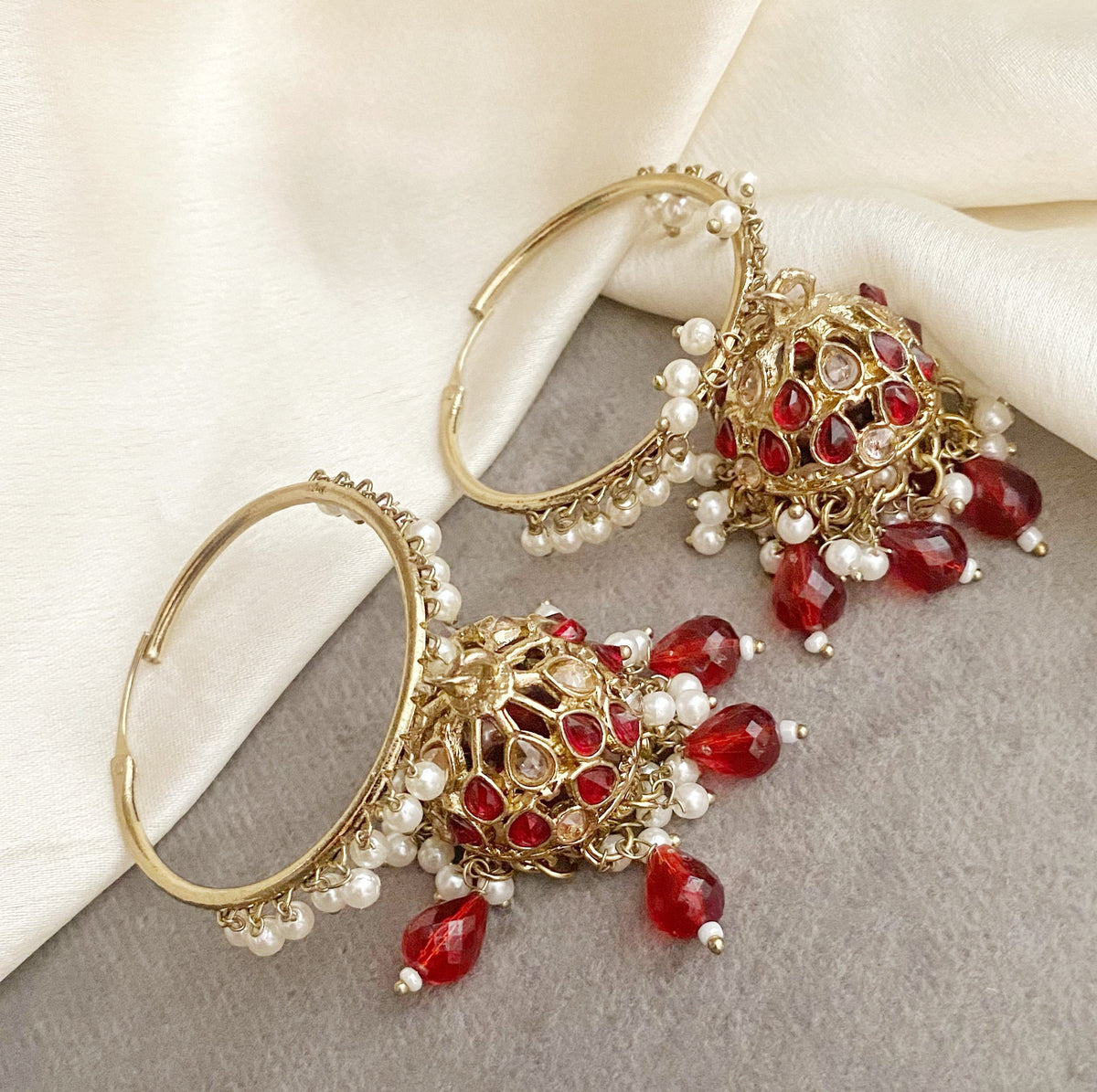Neeta red bali jhumka earrings