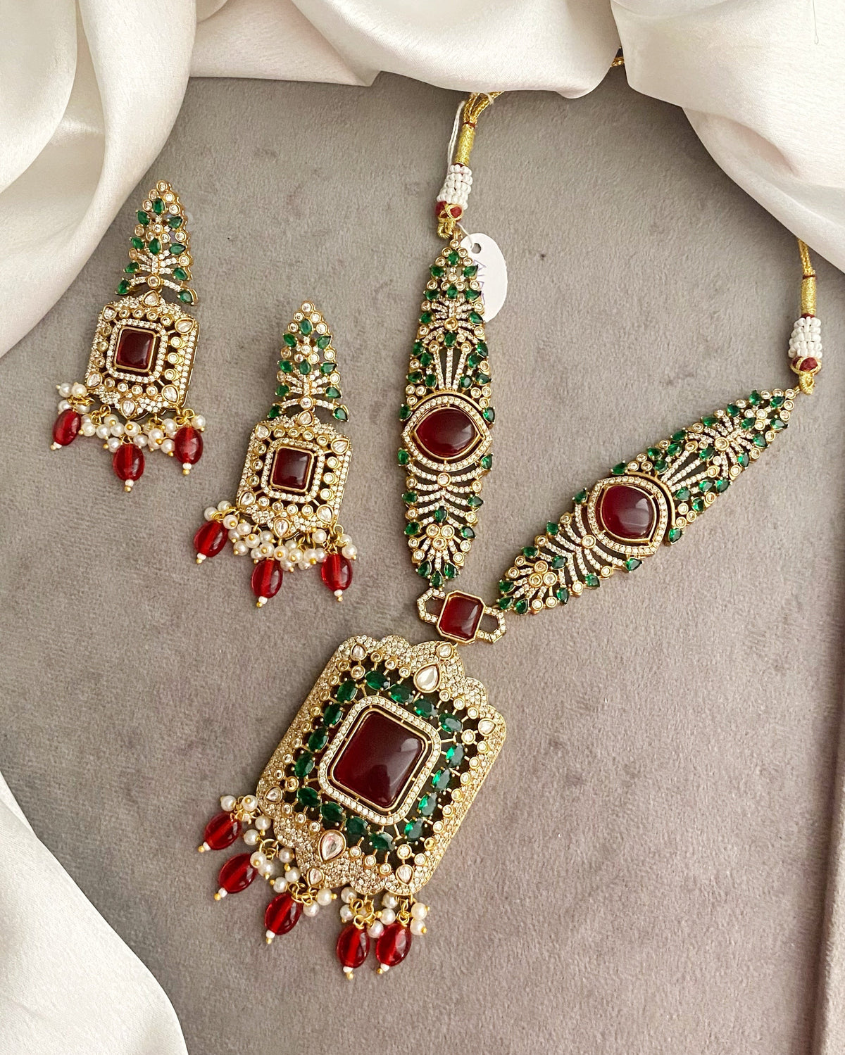 Lalita red green kundan necklace set