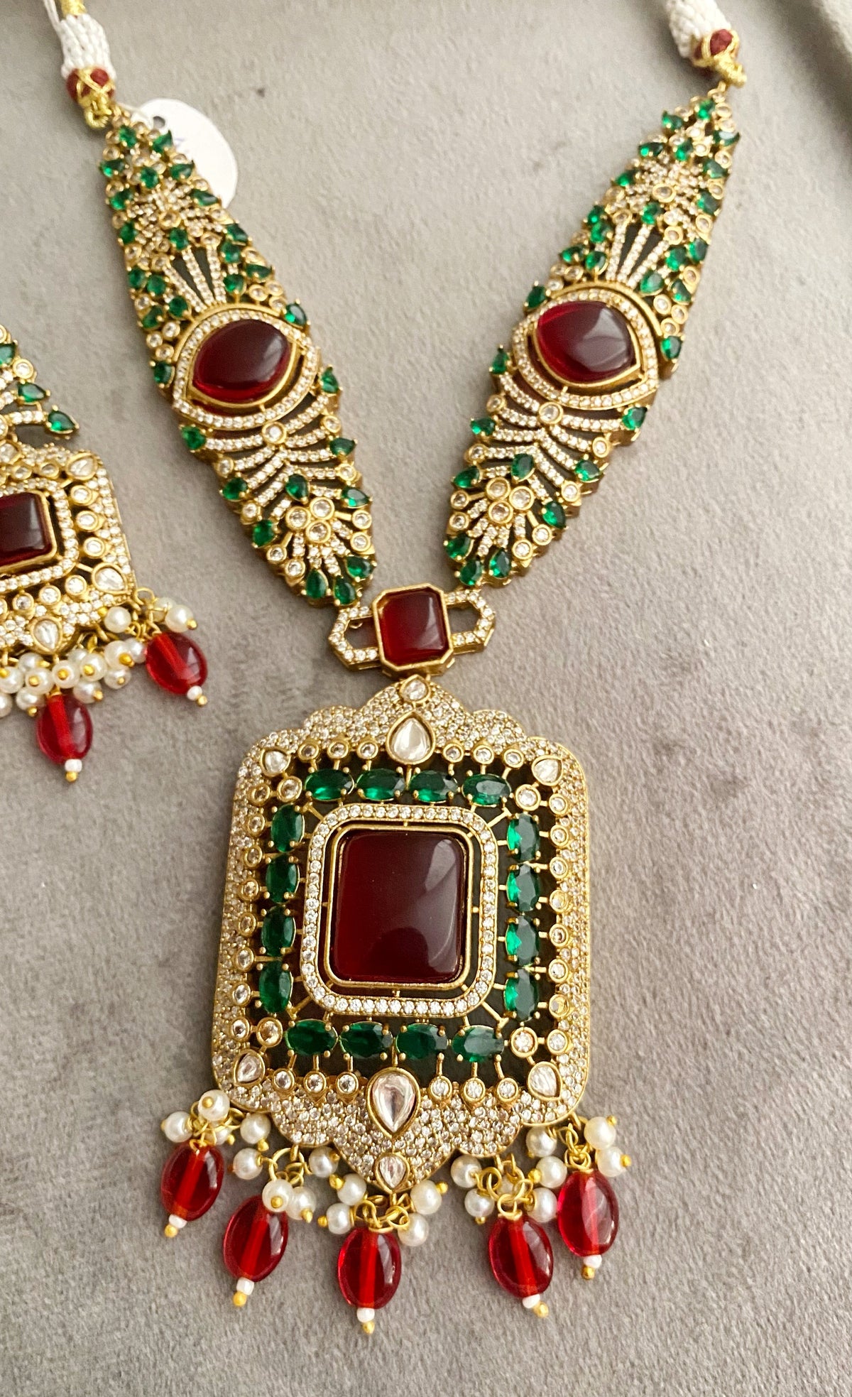 Lalita red green kundan necklace set
