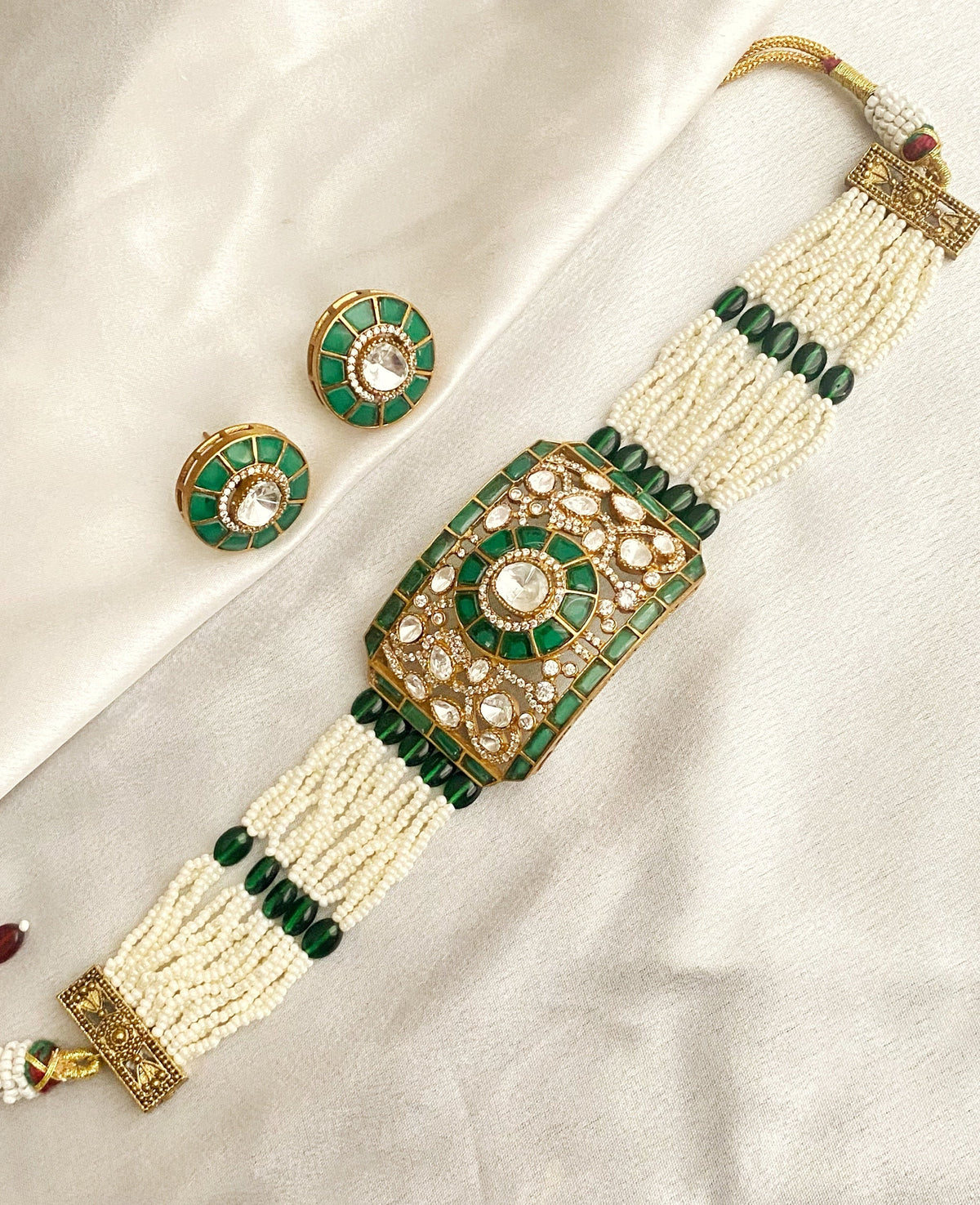 Emerald Nina mossionite kundan choker sets