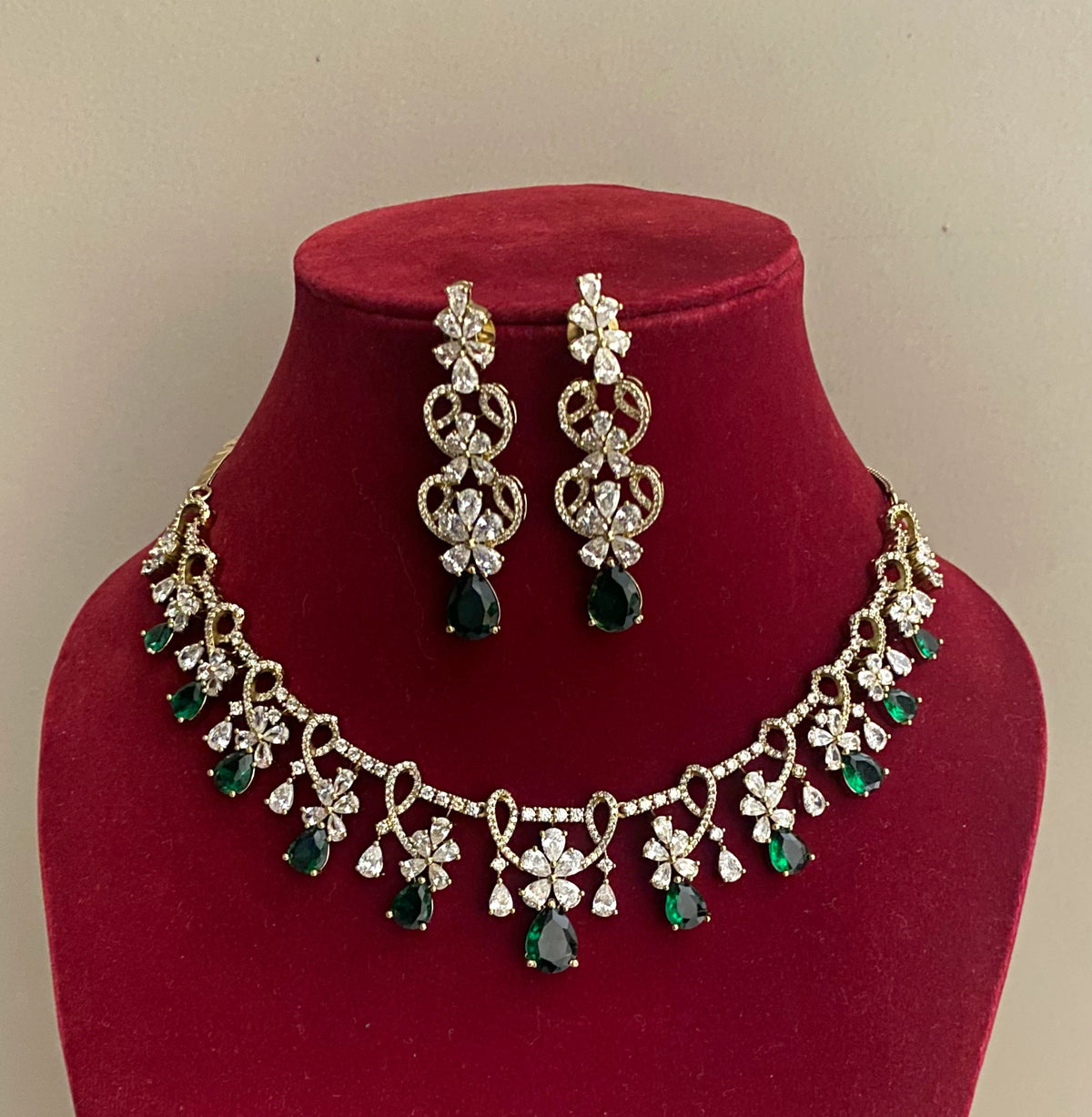 Emerald dipa american diamond necklace sets