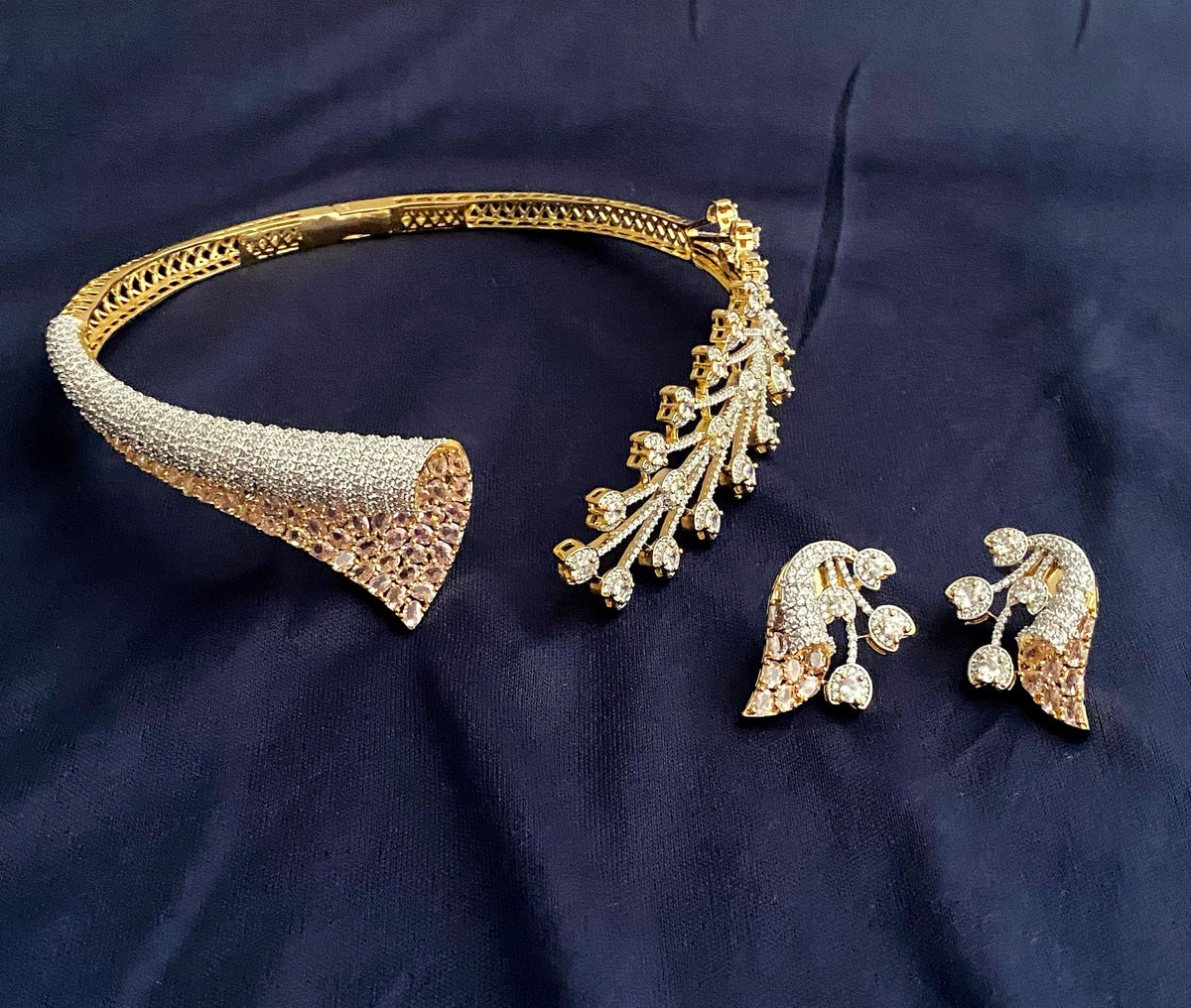 Yashika baby pink american diamond hasli necklace