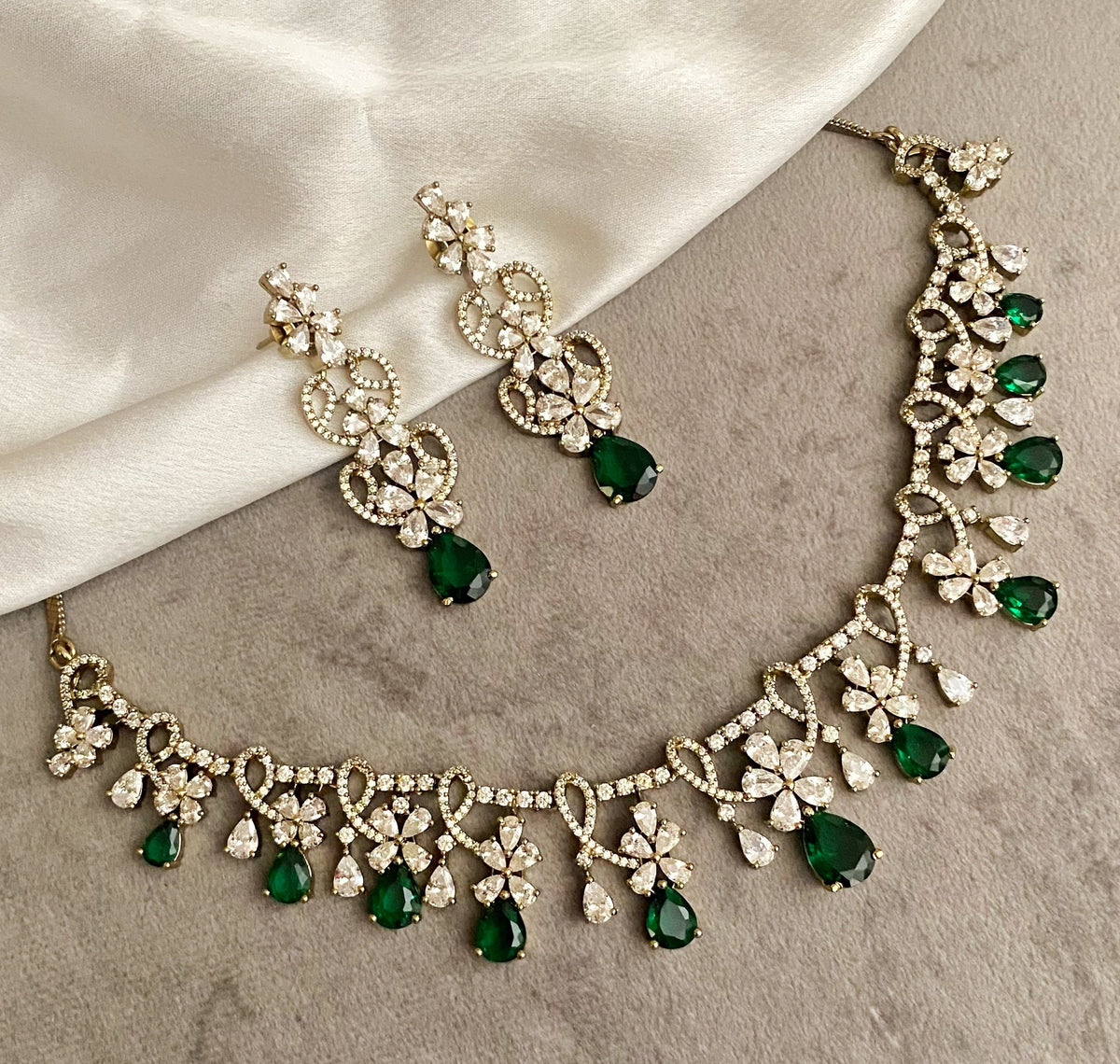 Emerald dipa american diamond necklace sets
