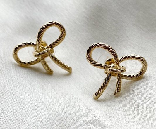Golden bow studs