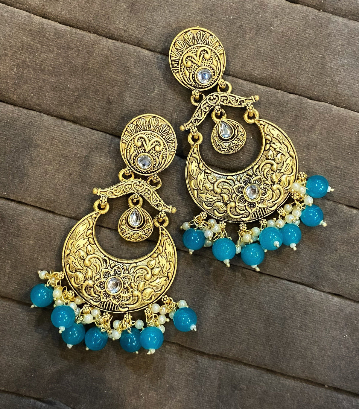 Rivha golden kundan chandbali earrings