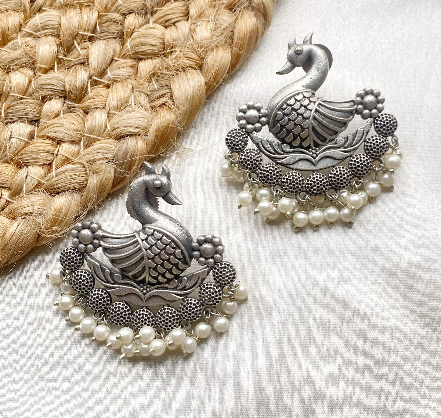 Swan oxidised studs