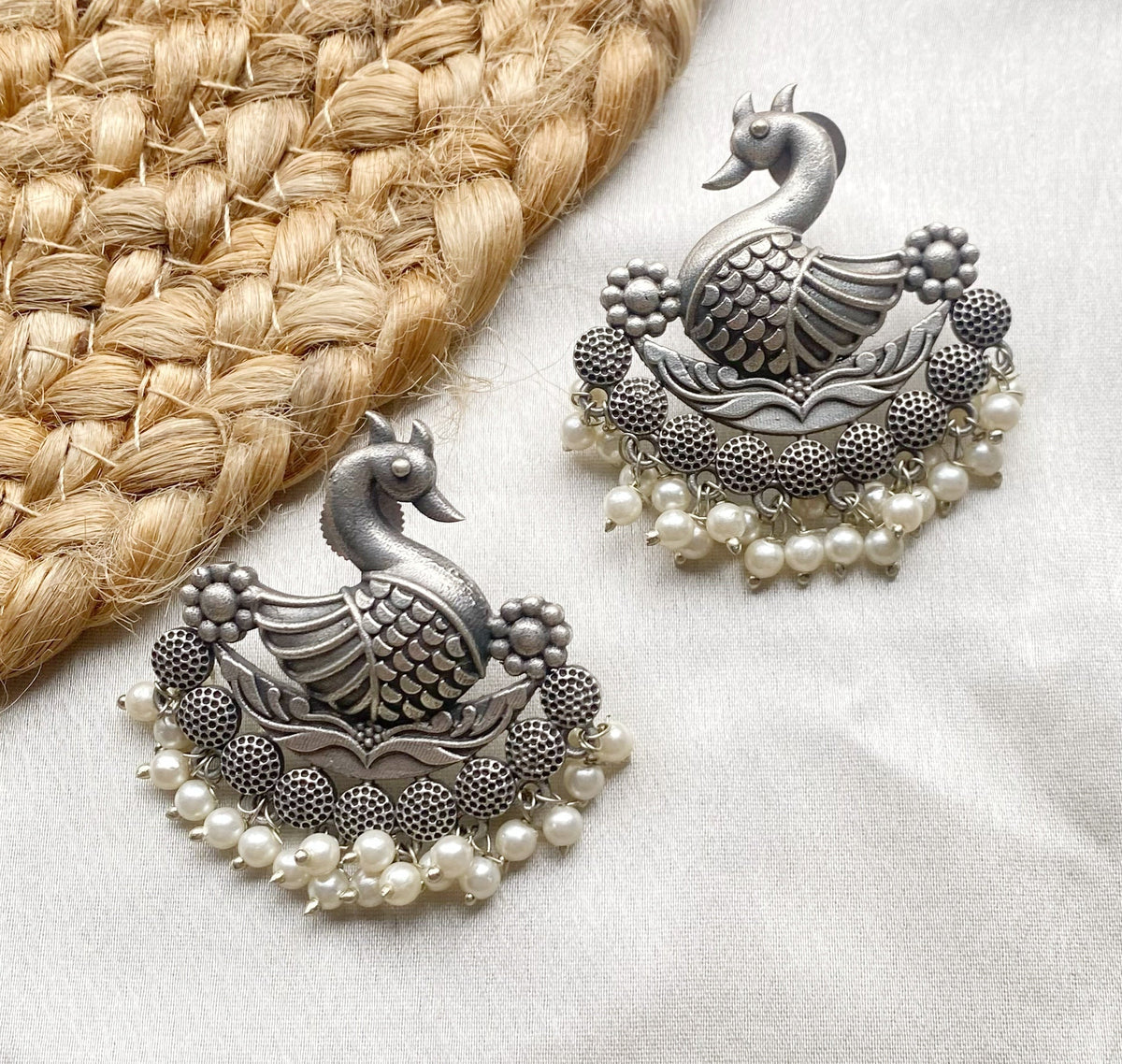 Swan oxidised studs